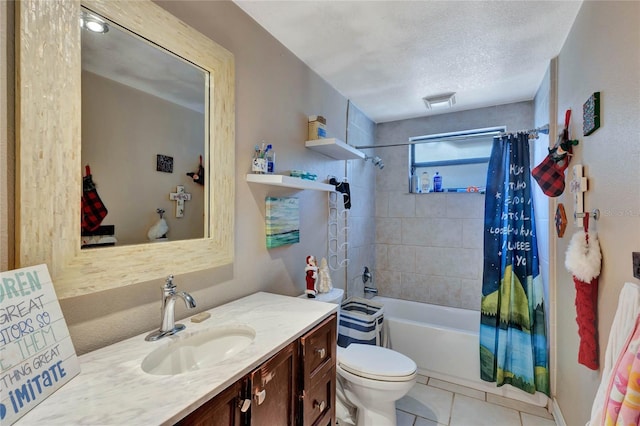 full bathroom featuring tile patterned floors, a textured ceiling, toilet, vanity, and shower / tub combo