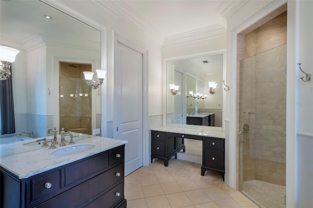 bathroom with vanity, ornamental molding, a shower with shower door, and tile patterned floors