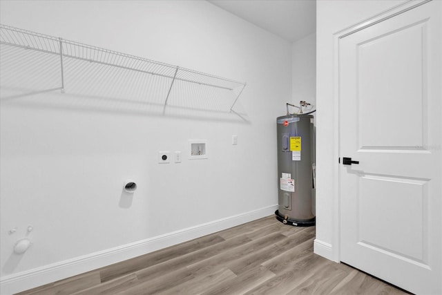 laundry area featuring hookup for a washing machine, hookup for an electric dryer, electric water heater, and light hardwood / wood-style flooring