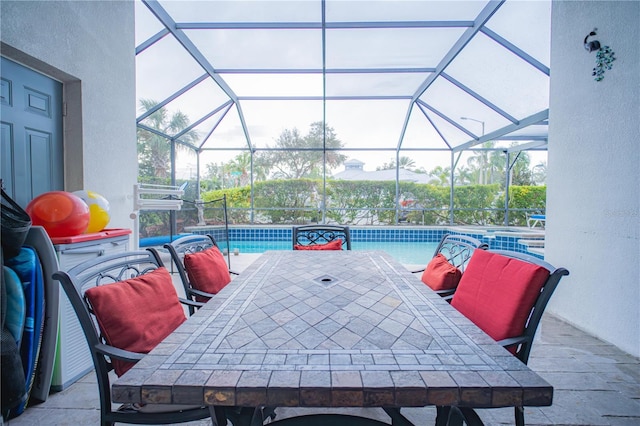 view of patio / terrace with glass enclosure