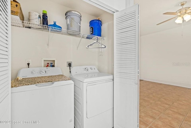 laundry room with ceiling fan, light tile patterned floors, and washer and dryer