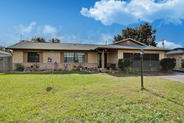 ranch-style house featuring a front lawn