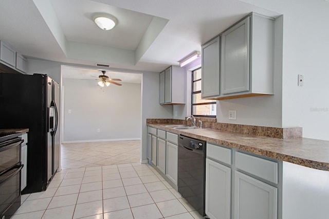 kitchen with black appliances, sink, ceiling fan, gray cabinets, and light tile patterned floors