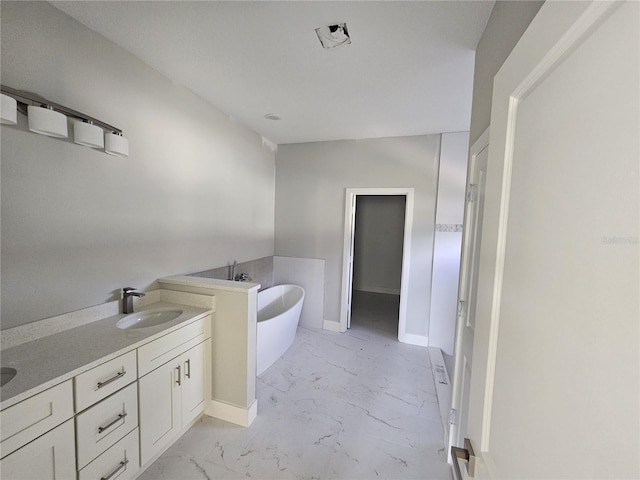 bathroom with a bathing tub and vanity