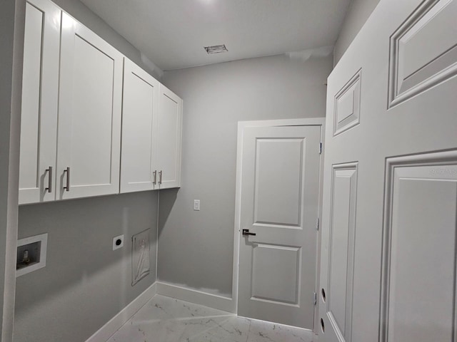 laundry area with washer hookup, cabinets, and hookup for an electric dryer