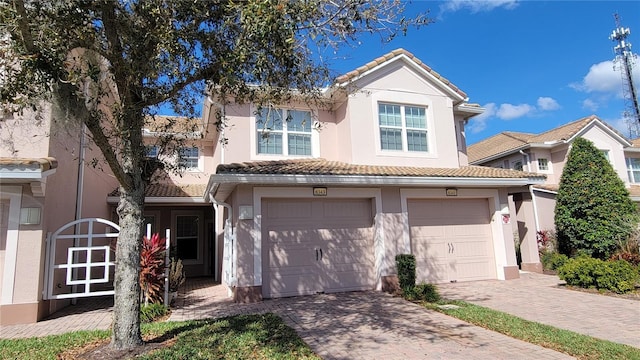 view of front of property with a garage