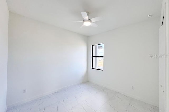 unfurnished room featuring ceiling fan