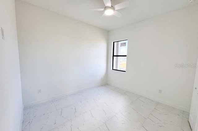 unfurnished room with ceiling fan