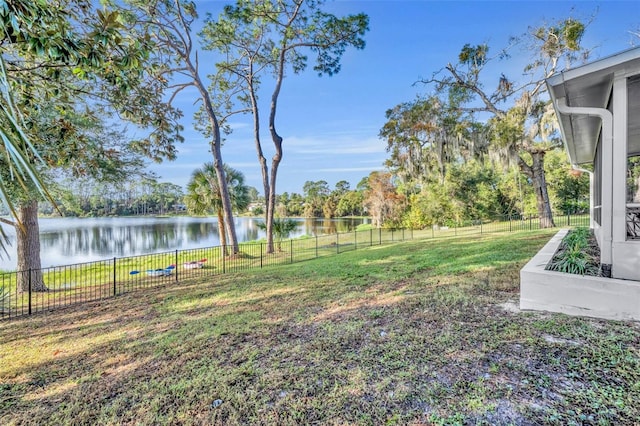 view of yard with a water view