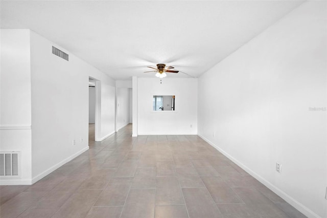 unfurnished living room with ceiling fan