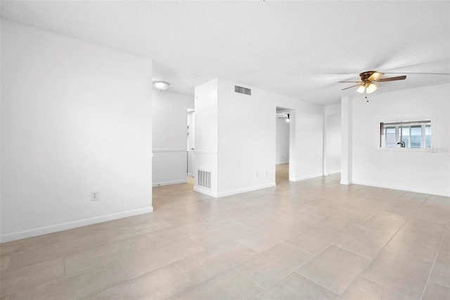 tiled empty room with ceiling fan