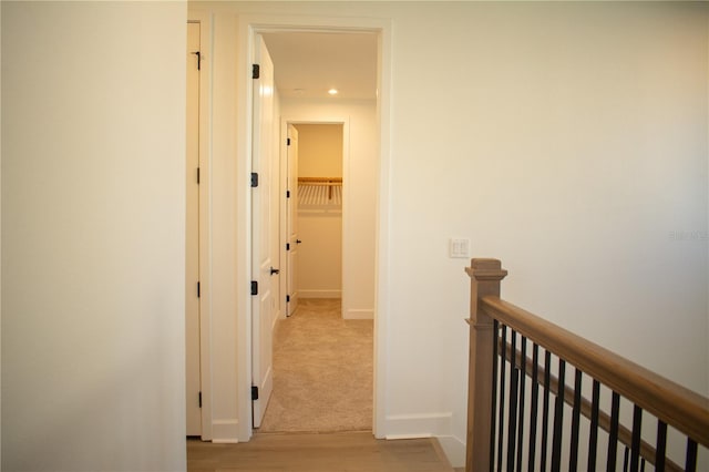 corridor featuring light hardwood / wood-style flooring