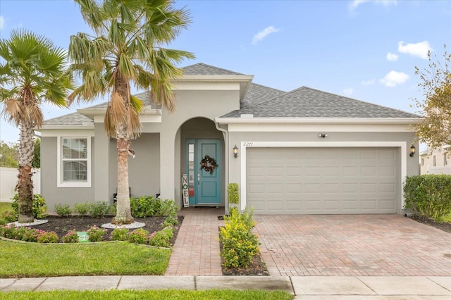 view of front of property with a garage