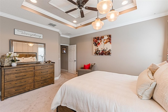 carpeted bedroom with a raised ceiling, ceiling fan, and ornamental molding