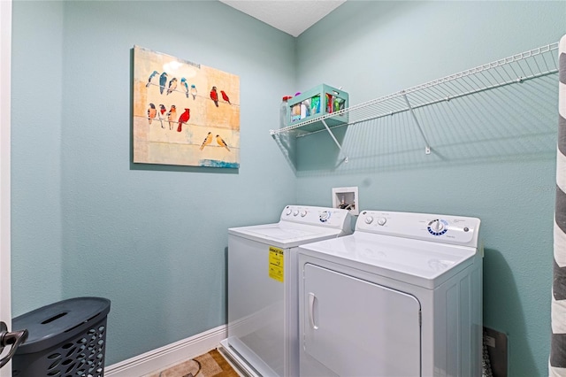 laundry room featuring washer and dryer