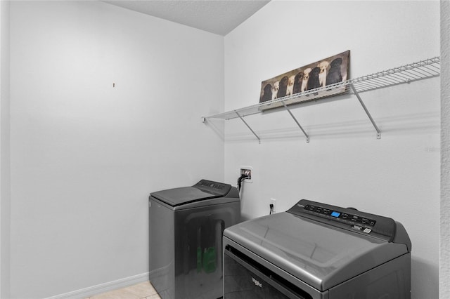 washroom featuring separate washer and dryer