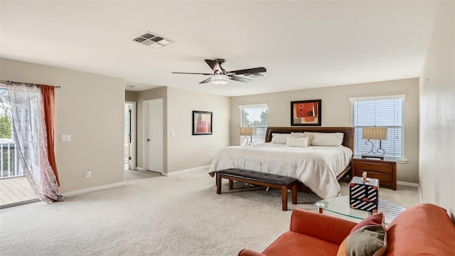 2377 Victoria Dr, Davenport, FL 33837 - bedroom featuring access to outside, light carpet, and ceiling fan