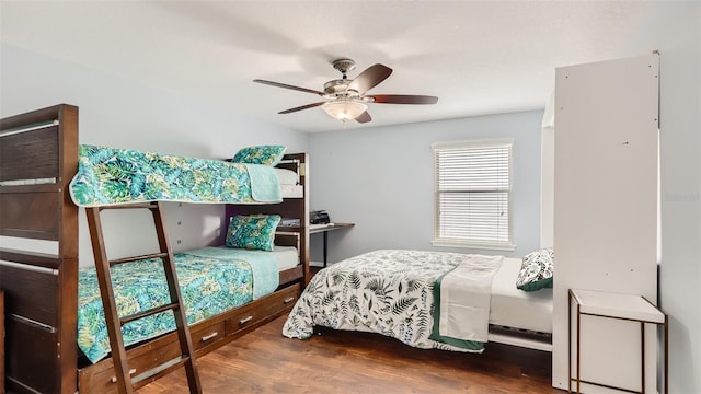 2377 Victoria Dr, Davenport, FL 33837 - bedroom featuring wood finished floors and a ceiling fan