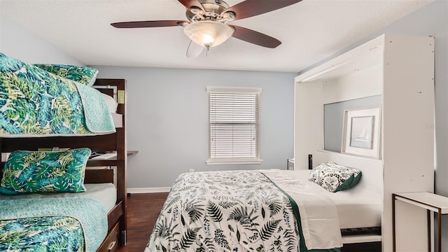 2377 Victoria Dr, Davenport, FL 33837 - bedroom featuring wood finished floors and ceiling fan