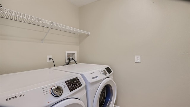 2377 Victoria Dr, Davenport, FL 33837 - washroom with independent washer and dryer