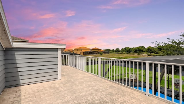 2377 Victoria Dr, Davenport, FL 33837 - view of balcony at dusk