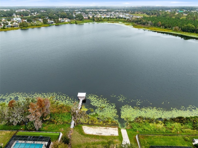 birds eye view of property featuring a water view