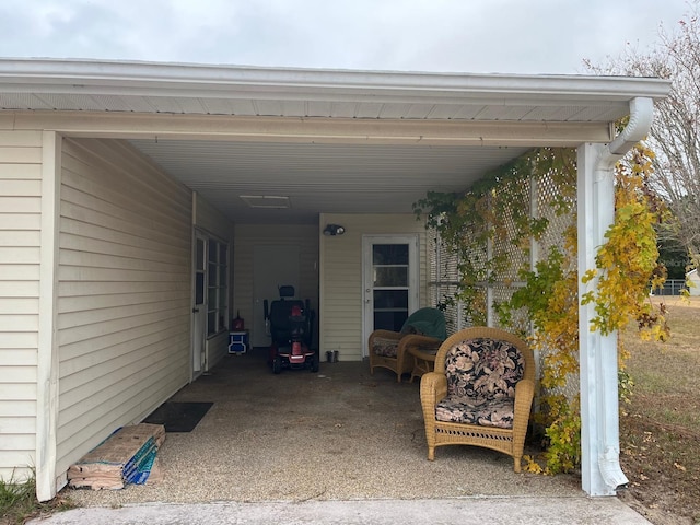 view of patio / terrace with a carport