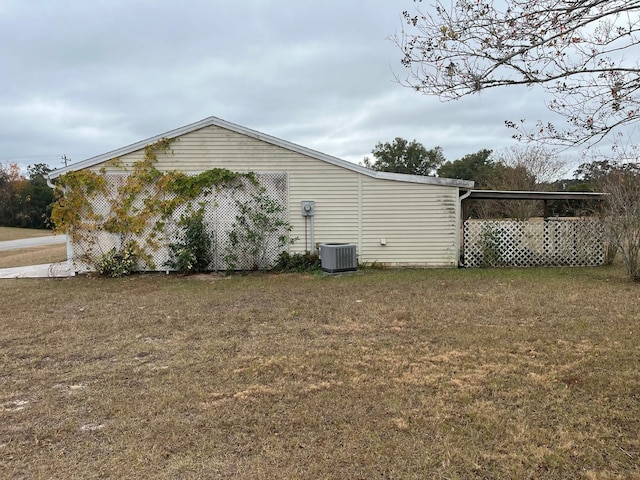 view of home's exterior with central AC unit