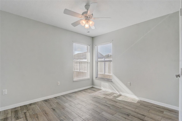 unfurnished room featuring ceiling fan