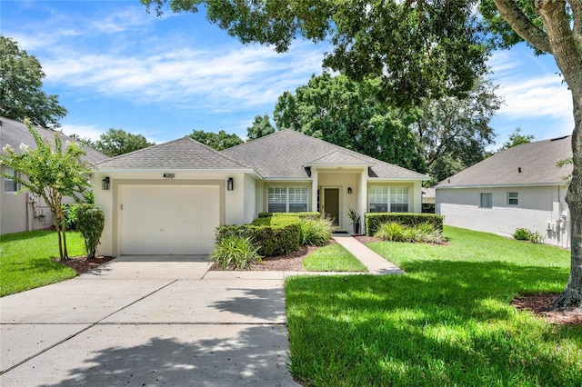 single story home featuring a garage and a front yard