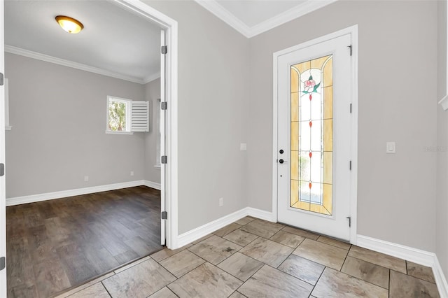 foyer entrance with light hardwood / wood-style flooring and ornamental molding