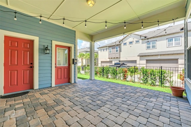 view of patio with a garage