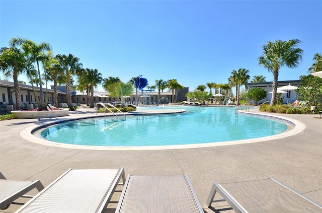 view of swimming pool featuring a patio