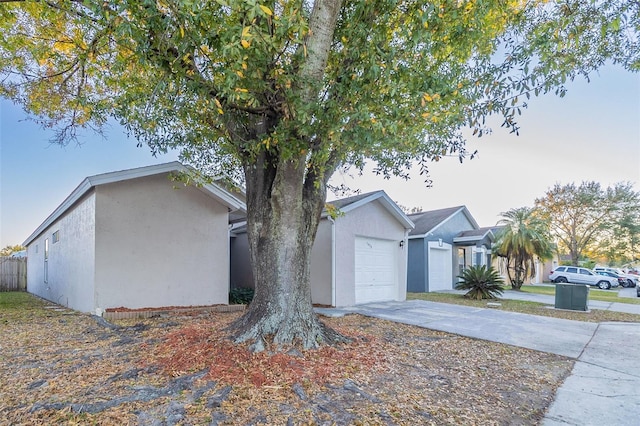 view of property exterior with a garage