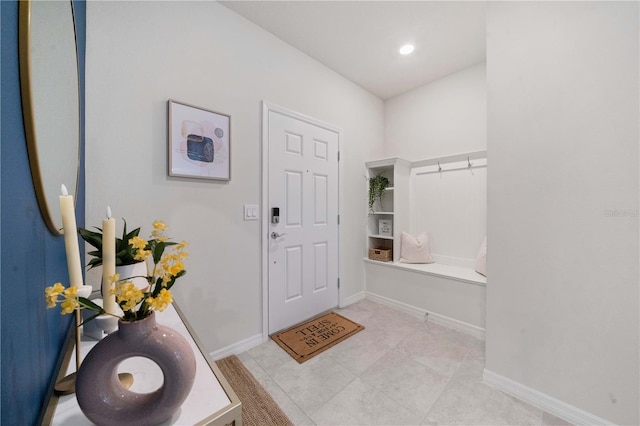 mudroom with light tile patterned flooring