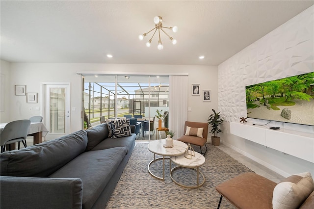 living room with an inviting chandelier