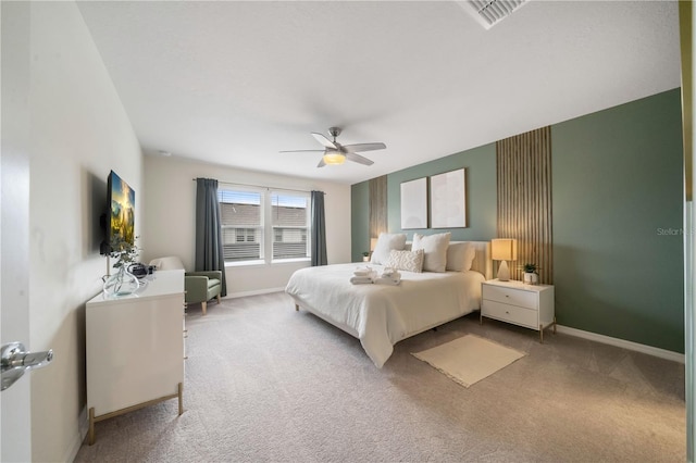 bedroom with ceiling fan and carpet floors