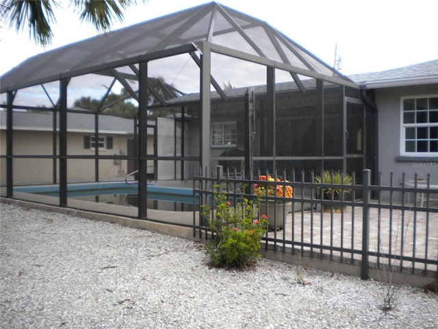 exterior space featuring a lanai