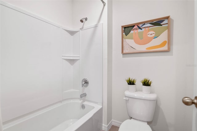 bathroom featuring toilet and shower / bathtub combination