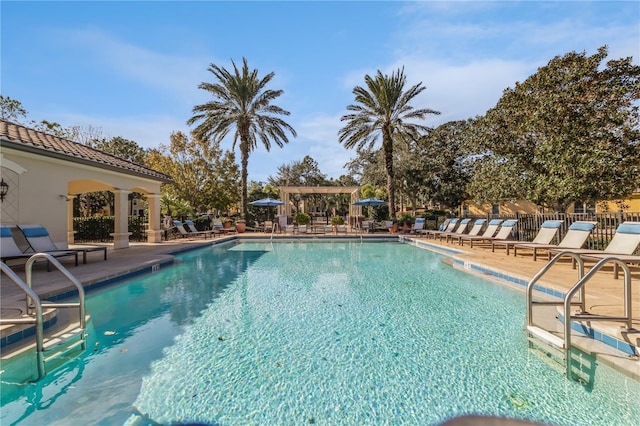 view of swimming pool featuring a patio