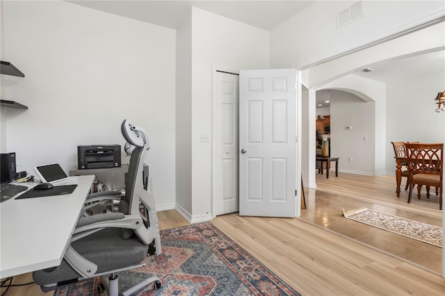 office space featuring hardwood / wood-style floors