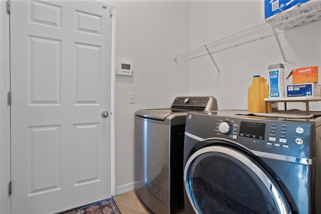 laundry room featuring washer and clothes dryer