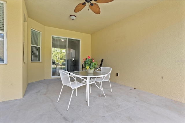 view of patio / terrace featuring ceiling fan