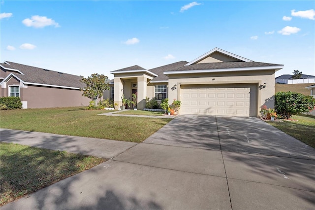 view of front of house featuring a front yard and a garage