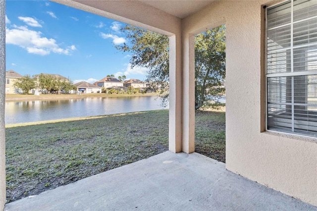 view of patio / terrace with a water view