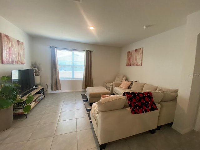 living area featuring light tile patterned flooring