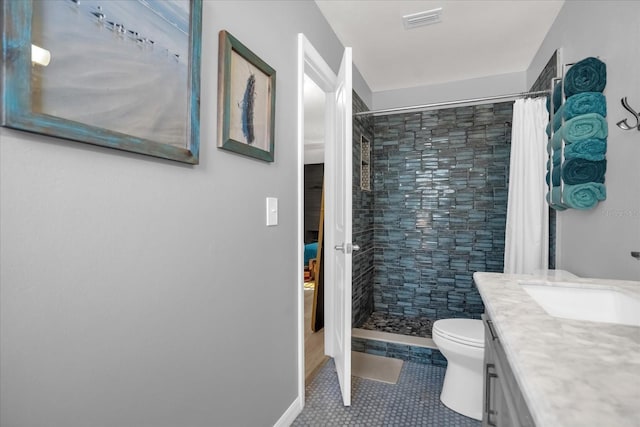 bathroom with tile patterned flooring, vanity, toilet, and a shower with curtain