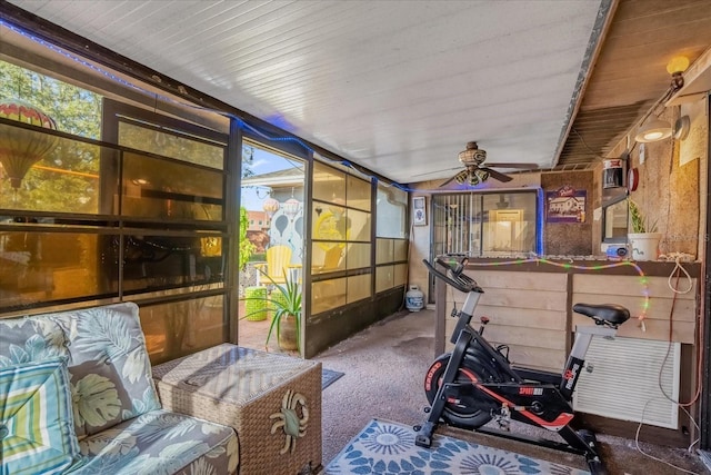 sunroom / solarium with ceiling fan