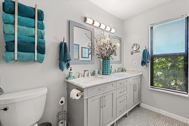 1608 Bomi Cir, Winter Park, FL 32792 - bathroom featuring double vanity and plenty of natural light