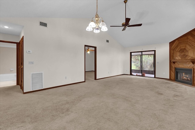 unfurnished living room featuring ceiling fan, a large fireplace, high vaulted ceiling, and light carpet